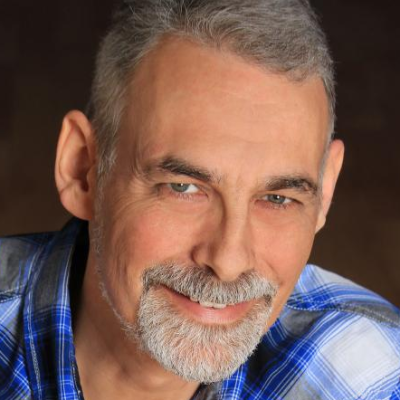 Closeup of Michael Charrois smiling at the camera